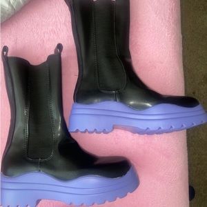 Beautiful purple and black boots  size 6 never worn just tried on. Women size 6